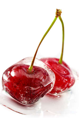 Close-up of frozen sweet cherry on white