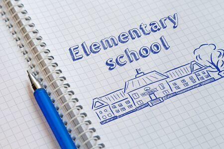 Text Elementary school handwritten on sheet of notebookの写真素材