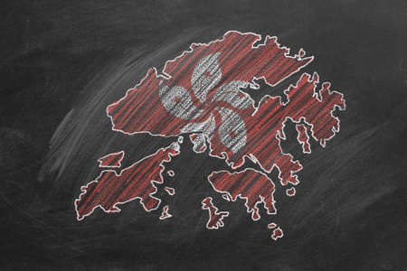Country map and flag of Hong Kong drawing with chalk on a blackboard. One of a large series of maps...