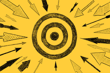 Many different arrows and target drawn on yellow background. Concept of threat, danger, menace, imminence, teamworkの写真素材