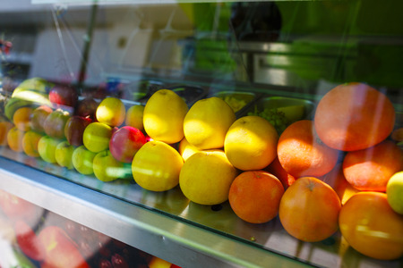 Fresh fruits for juice at the market. Display window