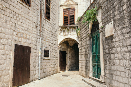 KOTOR, MONTENEGRO - AUGUST 2015 : Narrow streets of an old medieval town. UNESCO heritage site.のeditorial素材
