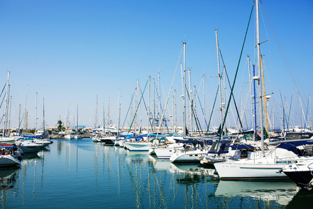 Yachts and boats in old port in Mediterranean sea