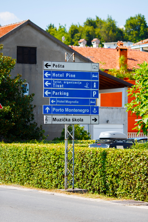 Montenegro, Tivat - August 2015 : Road sign plate with directions.のeditorial素材