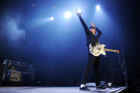 PRAGUE, CZECH REPUBLIC - AUGUST 15, 2014: Guitarist Tom DeLonge of Blink 182 During a performance in...