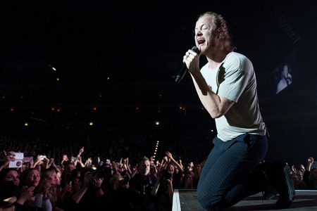 PRAGUE, CZECH REPUBLIC - JANUARY 16, 2016: Singer Dan Reynolds of the American rock band Imagine...