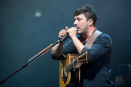 PRAGUE, CZECH REPUBLIC - MAY 20, 2016: Singer and guitarist Marcus Mumford of Mumford and Sons During a performance in Prague, Czech Republic, May 20, 2016.のeditorial素材
