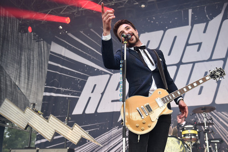 Hradec Kralove, CZECH REPUBLIC - JULY 3, 2016: Singer and guitarist Adam Grahn of Royal Republic During the performance at Rock for People festival in Hradec Kralove, Czech Republic, July 3, 2016.のeditorial素材