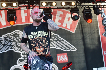 Hradec Kralove, CZECH REPUBLIC - JULY 4, 2016: Singer Ivan Moody of Five Finger Death Punch During a performance at Rock for People festival in Hradec Kralove, Czech Republic, July 4, 2016.のeditorial素材