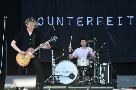 PRAGUE, CZECH REPUBLIC - JUNE 11, 2017: Singer and guitarist Jamie Campbell Bower (left) of Counterfeit during performance at Aerodrome festival in Prague, Czech Republic, June 11, 2017.のeditorial素材