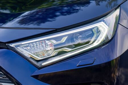 Front light of a blue car