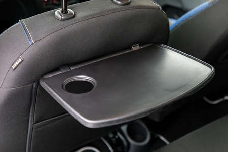 Foldable table in interior of a car