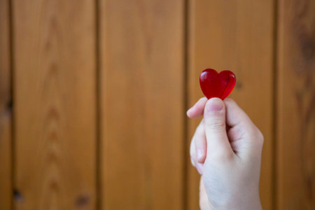 with heart in hands
