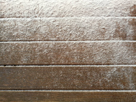 Snow drift on Wood Boards with Blank Space or Room for Copy, Text, or your Words. Horizontal with warm tonesの写真素材