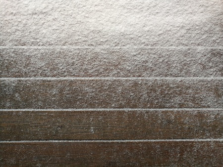 Snow drift on Wood Boards with Blank Space or Room for Copy, Text, or your Words. Horizontal with warm tonesの写真素材