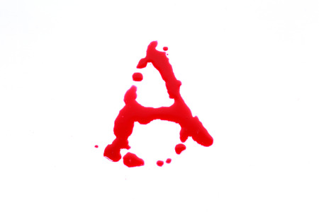 Bloody print on a white background with the letters Aの写真素材
