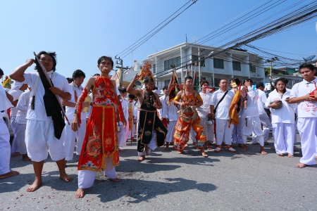 Nakhon Ratchasima, THAILAND - OCT 8  An unidentified devotee of Vegetarian Festival, person who invites the spirits of gods to possess their bodies on October 8, 2013 in Nakhon Ratchasima, Thailandのeditorial素材