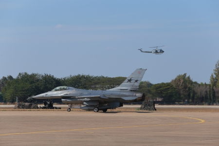 NAKHON RATCHASIMA THAILAND - JANUARY 11: The Children's Day . In this day have Air show from Thailand pilot .The Royal Thai Air force Base Airport 1st Airborne Division on January 11, 2014, in Nakhon Ratchasima Thailand.のeditorial素材