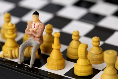 Businessman model on chess board.の写真素材