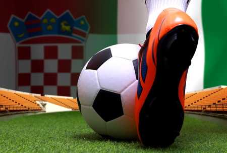 close up legs and feet of soccer player or football player walk on green grass ready to play football cup competition between the national Croatia and national Nigeria.の写真素材