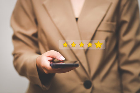 Customer pressing satisfaction with gold five star rating feedback icon and press level excellent...