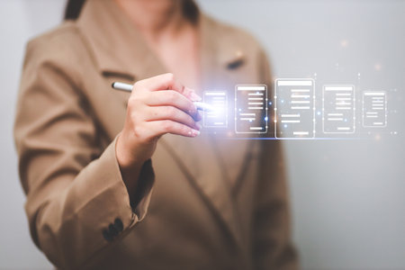 Business woman touching virtual monitor with document for online approve paperless quality assurance and ERP management concept.の写真素材