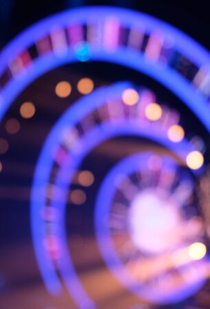 Blue and pink neon abstract round lightの写真素材