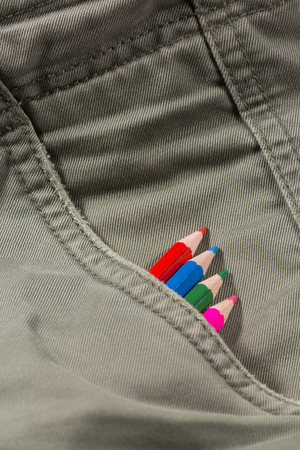 colored pencils in pocketの写真素材
