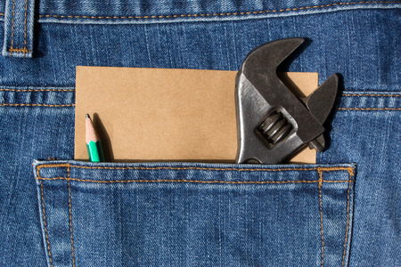 Wrench in  blue jean pocket