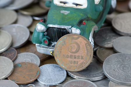Old coins and carの写真素材
