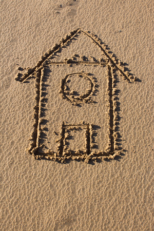 home drawing on sandの写真素材
