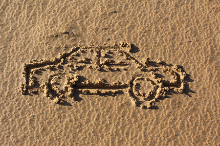 car drawing on sandの写真素材