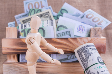 Mannequin and Wooden Money Crateの写真素材