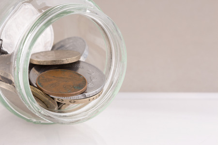 Old coins in jar