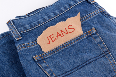 JEANS written on paper in the jeans pocketの写真素材
