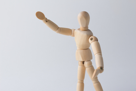 Wooden dummy with open armsの写真素材