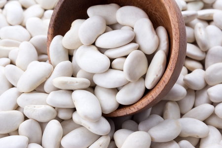 Haricot beans with wooden bowlの写真素材