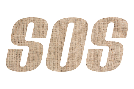 SOS word with burlap texture on white backgroundの写真素材