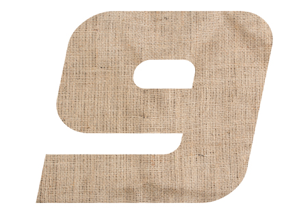 Number 9 with burlap texture on white backgroundの写真素材