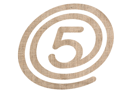 Number 5 with burlap texture on white backgroundの写真素材