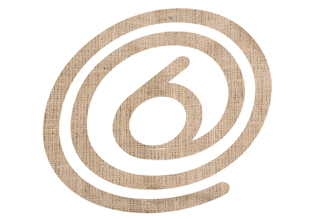 Number 6 with burlap texture on white backgroundの写真素材