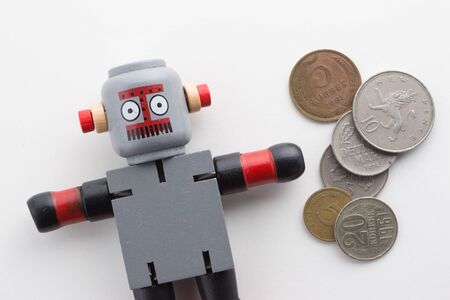 Wooden Robot with Old Coins.