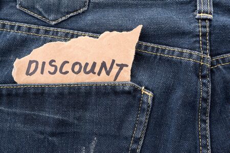 DISCOUNT note in jeans pocket.の写真素材