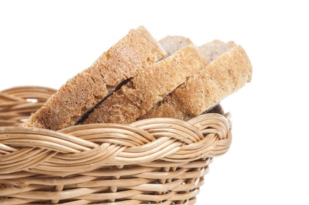 three slices of bread in basket on white backgroundの写真素材