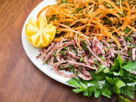 Dietary salad with carrot parsley and onionの写真素材