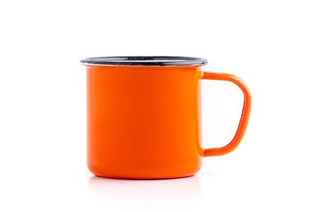 Enamel metal camp mug for coffee or tea on white backgroundの写真素材