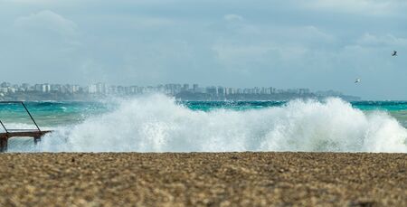 big waves hitting the Konyaalti coast on a stormy day.の写真素材