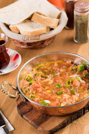 Traditional turkish breakfast food menemen made by eggs and tomatoesの写真素材