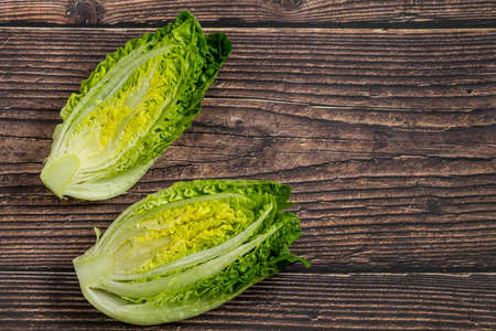 new harvest fresh Romaine Lettuce on wooden background