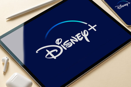 Antalya, TURKEY - June 12, 2022. Disney Plus app icon on iphone smartphone and ipad tablet screenのeditorial素材